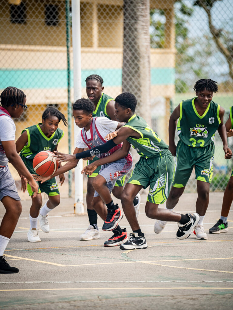 Lester Vaughan versus Coleridge and Parry during the NSC U15 Basketball Competition showing players in action at the Garfield Sobers Gymnasium in Barbados.